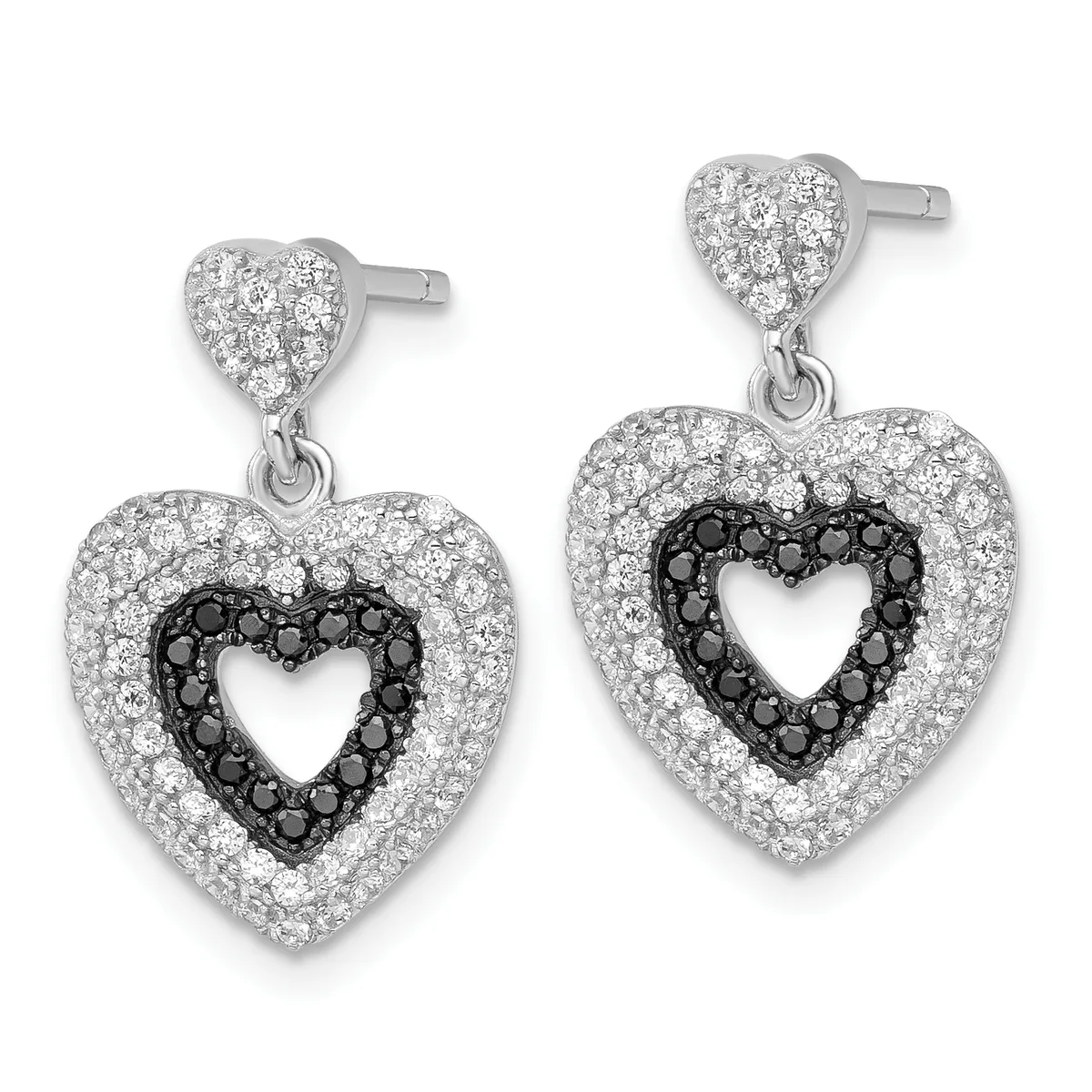 A pair of silver heart-shaped dangle earrings with white and black cubic zirconia stones, featuring a smaller heart stud with a larger heart pendant below.