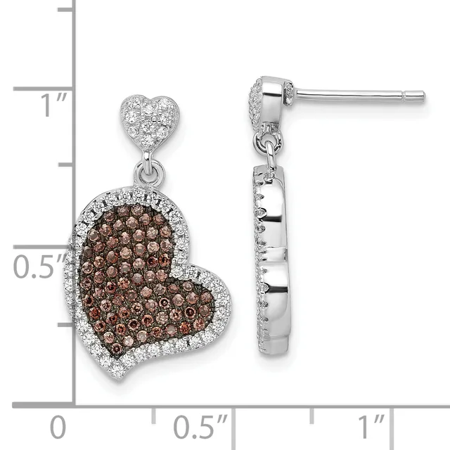 Silver heart dangle earrings with small diamond-shaped studs at top and larger heart-shaped pendants paved with brown and white crystals, shown next to a measurement ruler.
