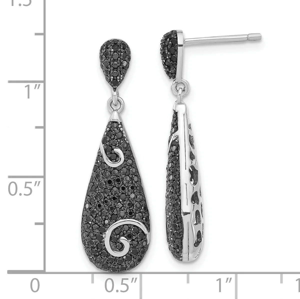 A pair of silver teardrop earrings with black gemstone paving and decorative spiral cutouts, displayed against a measurement scale showing approximately 1.25 inches in length.