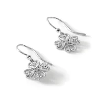 A pair of silver drop earrings with ornate four-lobed clover-shaped pendants featuring small diamond accents, suspended from curved wire hooks.