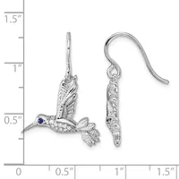Silver hummingbird dangle earrings with diamond-like sparkle, sapphire eyes, and fish hook backs, shown next to a measurement ruler.