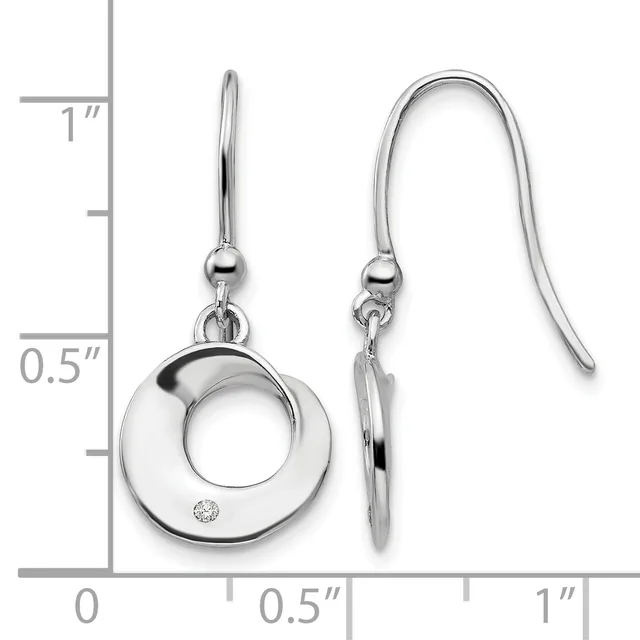 Silver dangle earrings with circular open designs and small diamond accents, shown next to a ruler measuring approximately one inch in length.