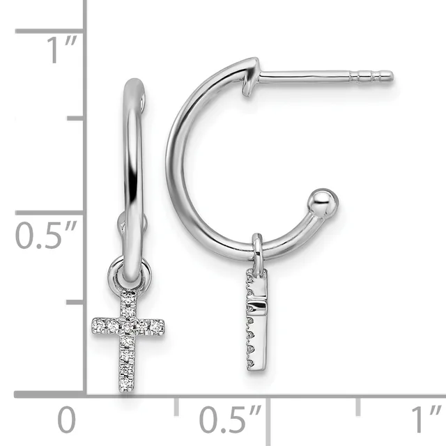 Pair of silver hoop earrings with dangling diamond-set cross charms, shown with measurement scale indicating approximately one inch in length.