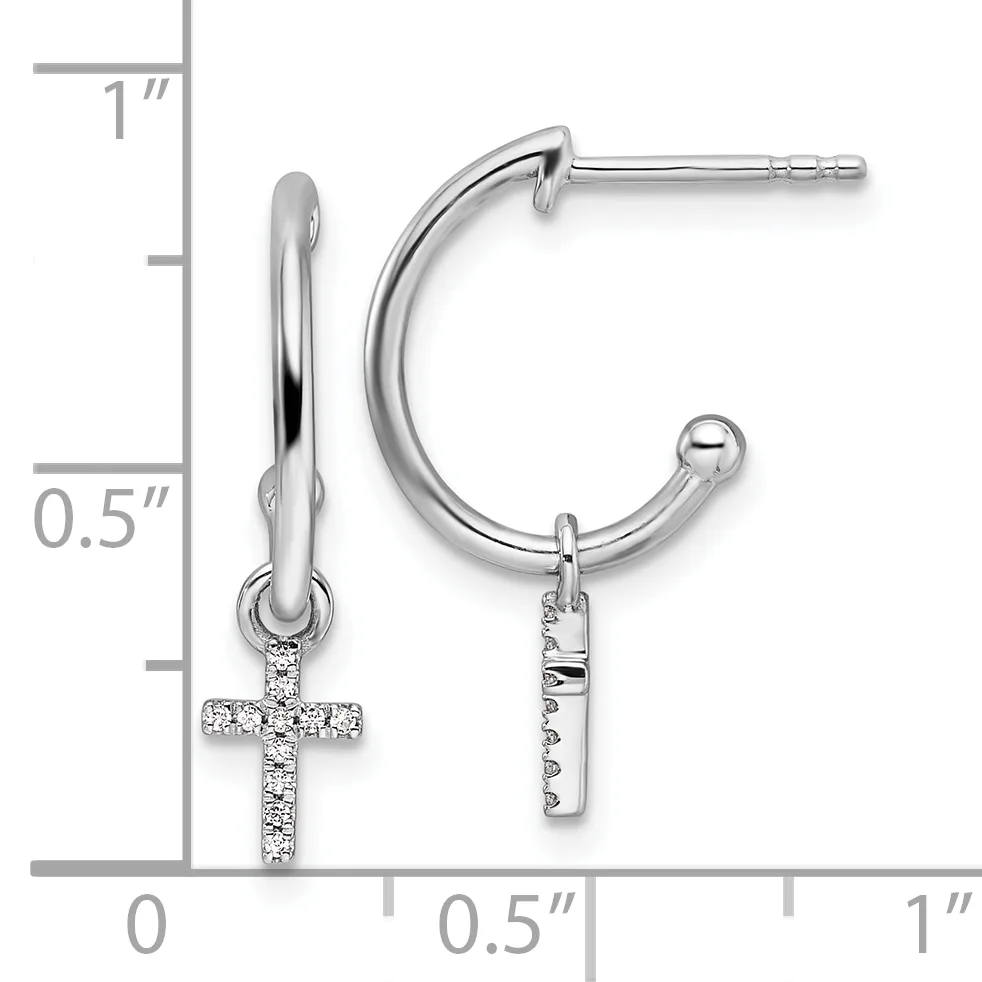 Pair of silver hoop earrings with dangling diamond-set cross charms, shown with measurement scale indicating approximately one inch in length.