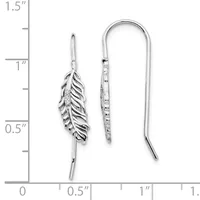 Two silver feather-shaped dangle earrings with textured details, shown front and back views next to a measurement ruler indicating approximately one inch in length.