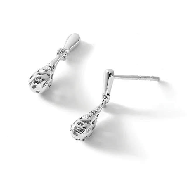 A pair of silver teardrop earrings with ornate filigree detailing and stud posts, displayed against a white background.