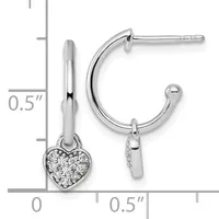 Silver hoop earrings with heart-shaped charms encrusted with cubic zirconia, displayed against a measurement scale showing approximately half-inch diameter.