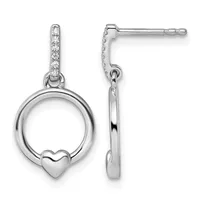 Pair of silver dangle earrings with diamond-set posts, circular open frames, and small heart charms, shown from front and side views.