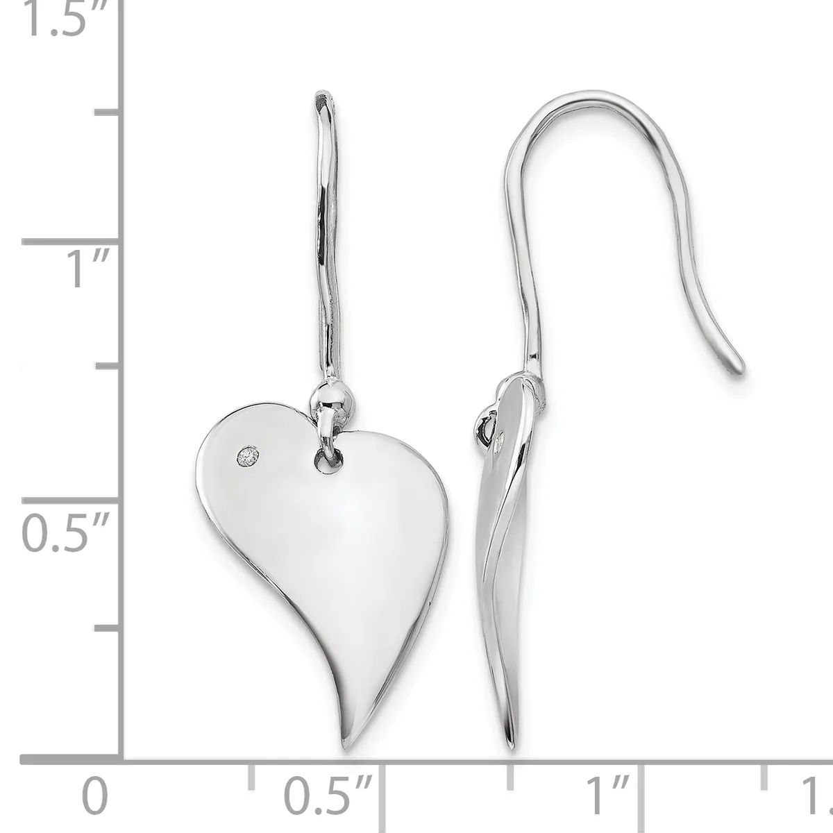 A pair of silver heart-shaped dangle earrings with fish hook closures, displayed against a measurement scale showing approximately one inch in length.