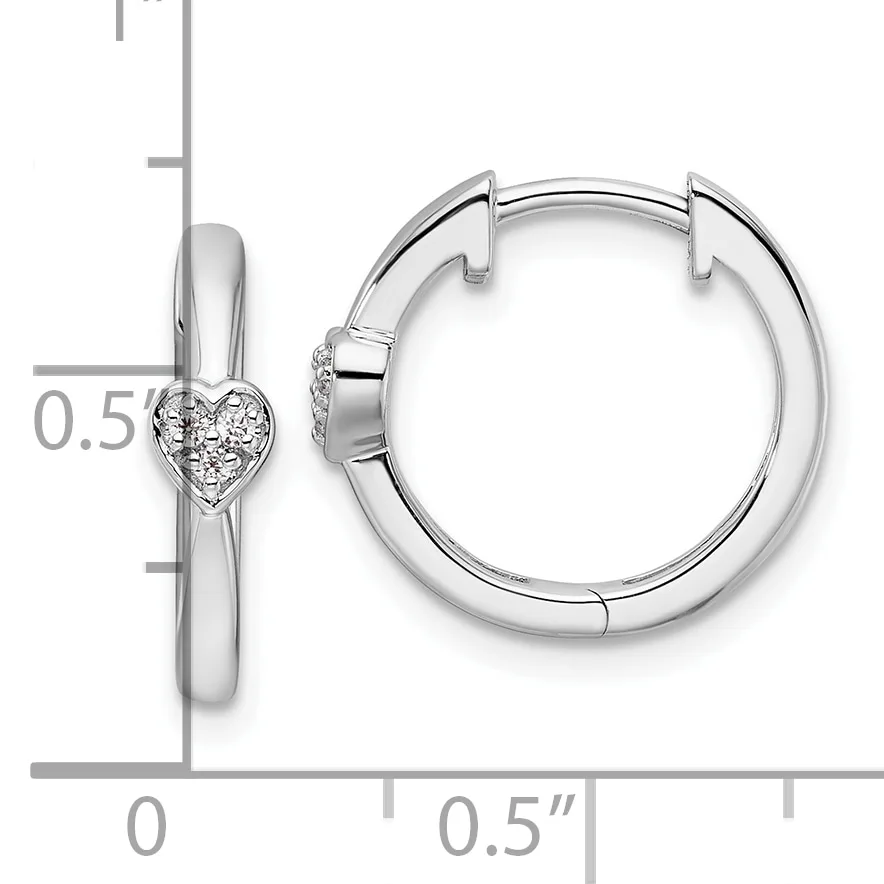 Silver hoop earrings with heart-shaped diamond accents, shown from front and side views with a measurement scale indicating approximately 0.5 inches in diameter.