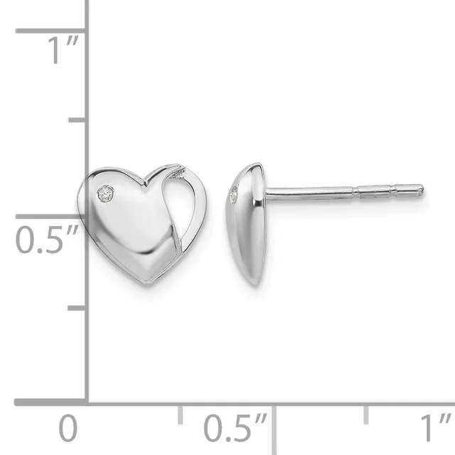 A pair of polished silver heart-shaped stud earrings with small diamonds, displayed on a ruler showing approximately half-inch dimensions.