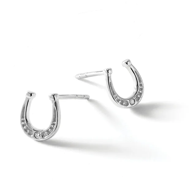 Pair of silver horseshoe-shaped stud earrings set with clear rhinestones along the curved bottom, displayed on a white background.