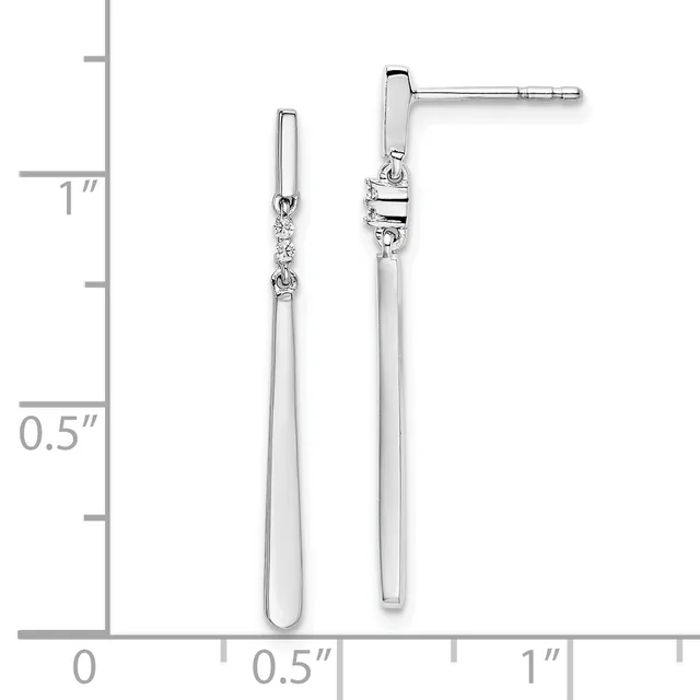 Two long silver earrings with diamond accents near the top and polished oval drops, shown against a measurement scale indicating approximately one inch in length.