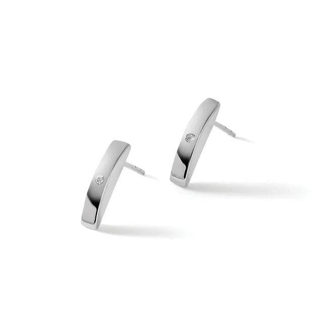 A pair of polished silver rectangular hoop earrings with small round gemstones, shown at angles against a white background.