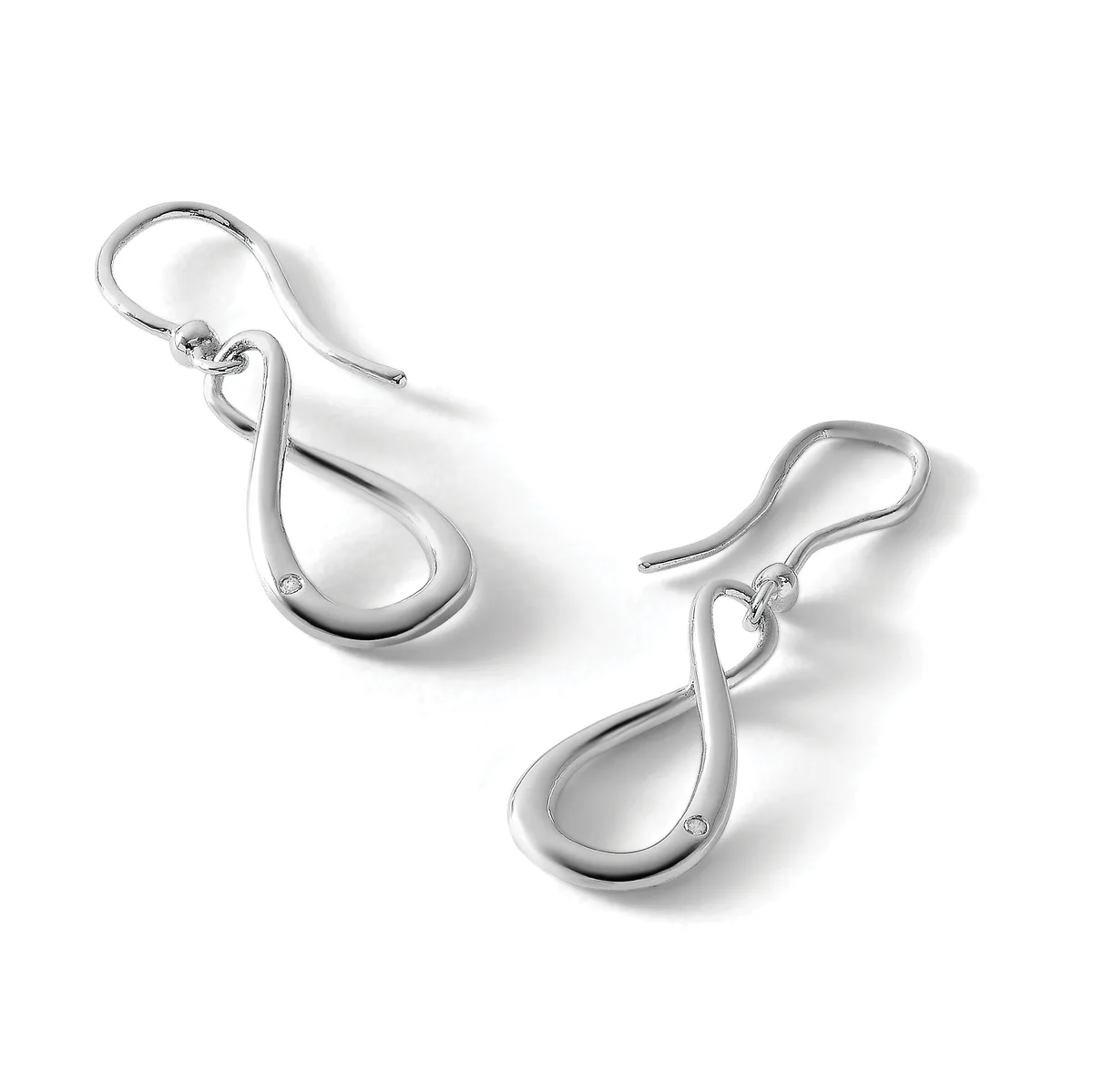 A pair of silver teardrop-shaped earrings with fish hook closures, displayed against a white background.
