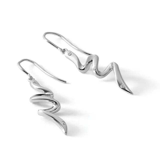 A pair of silver drop earrings with curved, wavy designs and small diamond accents, displayed against a white background.