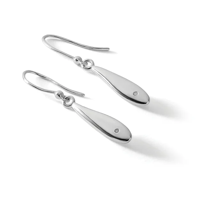 A pair of silver teardrop earrings with small diamond accents, suspended from curved wire hooks.