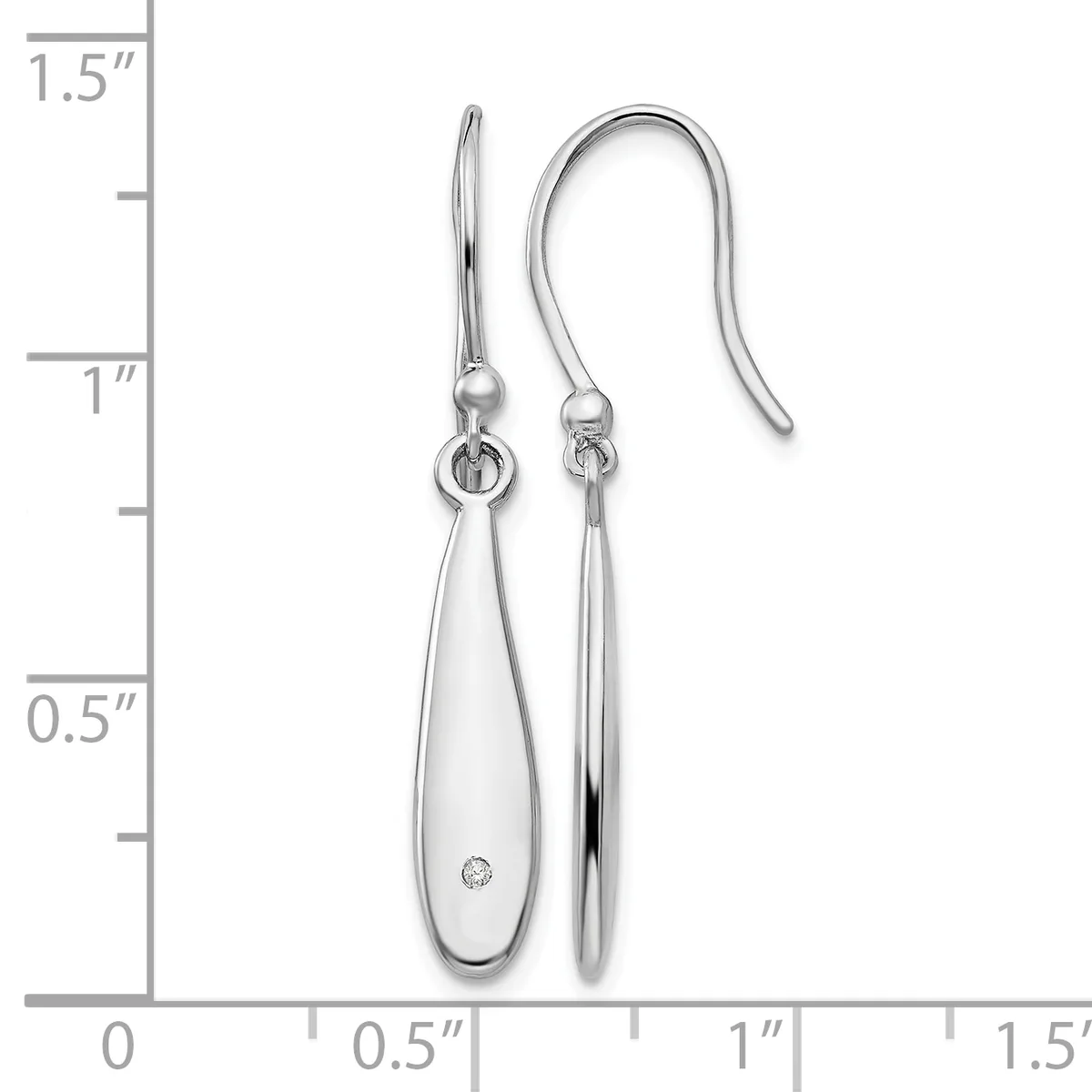 A pair of silver teardrop earrings with small diamond accents, displayed on a measurement scale showing they are approximately one inch long.