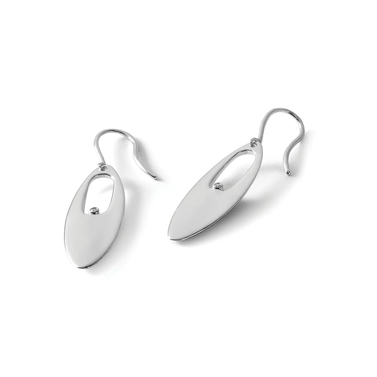 A pair of silver oval dangle earrings with hook closures displayed against a white background.