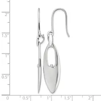 A pair of silver oval dangle earrings with elongated hook wires, displayed against a ruler showing measurements up to 2.5 inches.