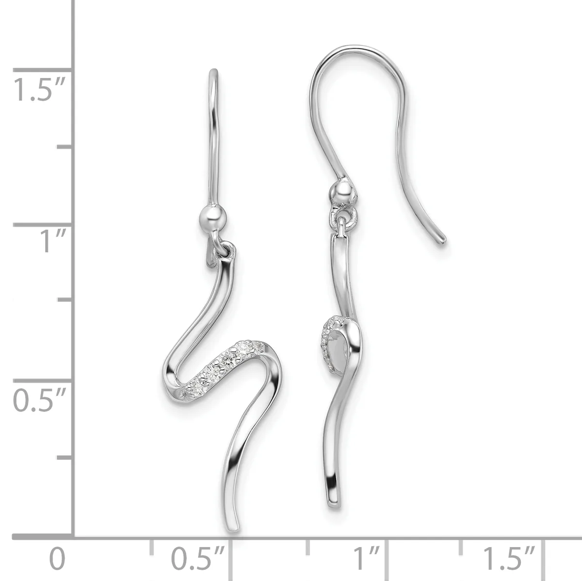 A pair of silver curved drop earrings with fish hook wires, one featuring a small textured section, displayed against a measurement scale showing approximately 1.5 inches in length.