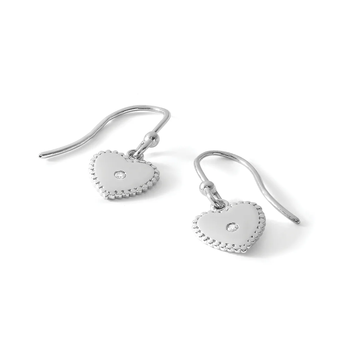 Pair of silver heart-shaped dangle earrings with beaded edges and small center crystals, suspended from curved ear wires.