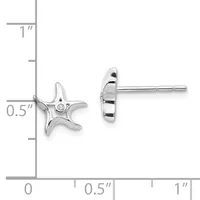 Pair of silver starfish stud earrings with small diamond centers, shown front and side view with measurement scale indicating approximately 0.5 inches in height.