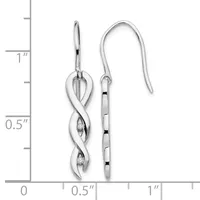 A pair of silver drop earrings with twisted vine-like designs and small diamond accents, shown next to a measurement scale indicating approximately one inch in length.