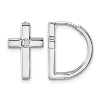 A pair of silver hoop earrings with a cross-shaped stud earring featuring a round diamond at its center.