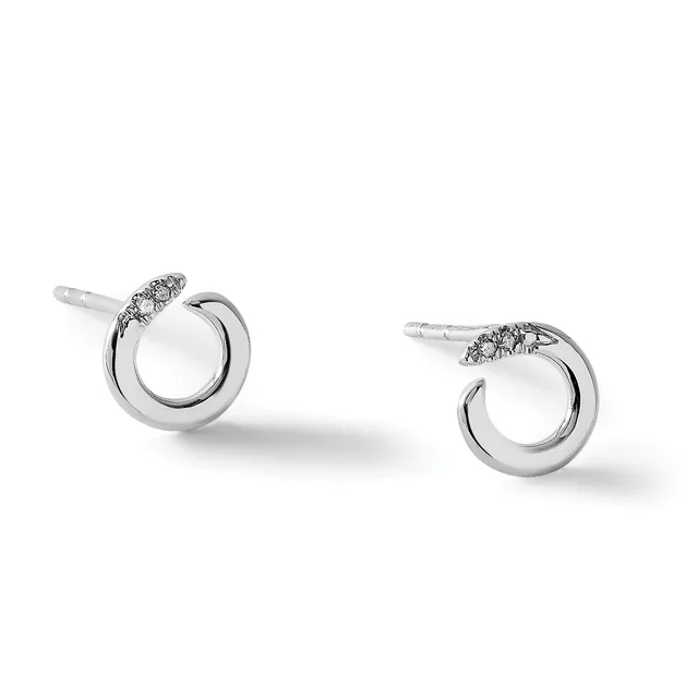 A pair of silver stud earrings with circular frames and small diamond accents on top, shown from a three-quarter view against a white background.