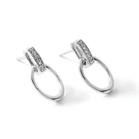 A pair of silver drop earrings with diamond-set rectangular tops and polished oval loops hanging below, shown from a three-quarter view.