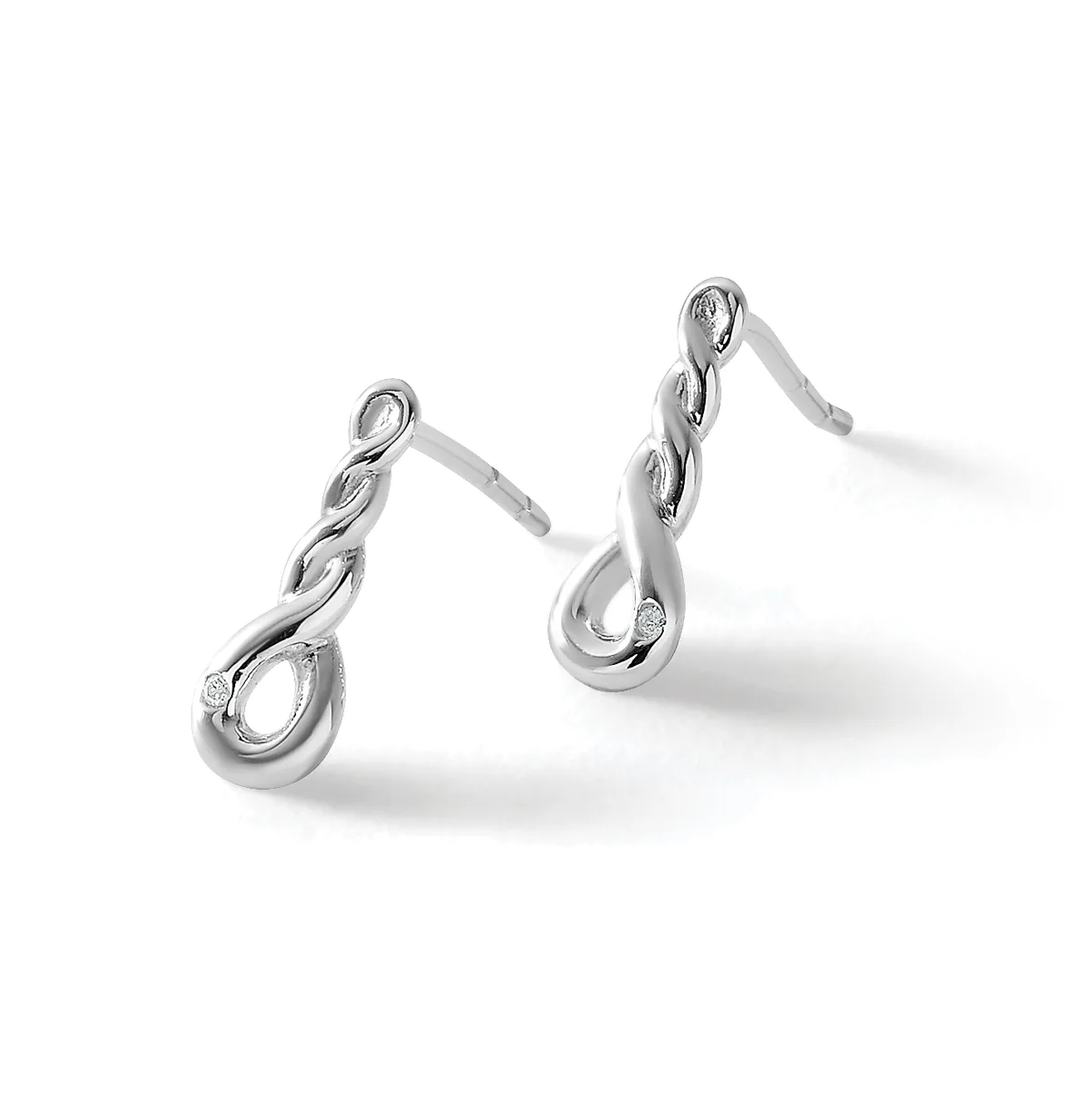 A pair of silver twisted teardrop earrings with post backs, displayed against a white background.