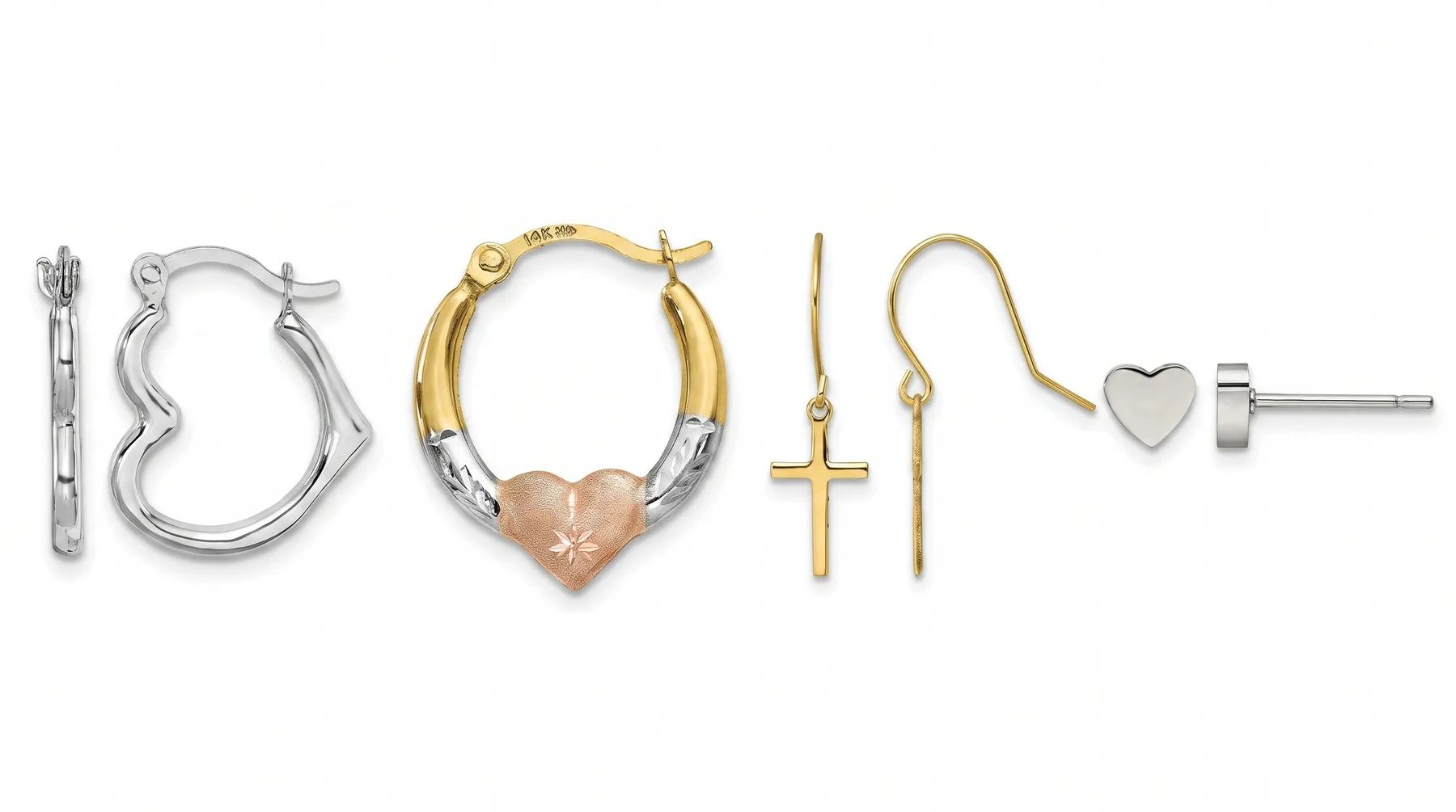 Five pairs of earrings displayed in a row, including heart-shaped hoops in silver and gold with a rose gold heart charm, cross drop earrings in gold, and small stud earrings in silver and gold.